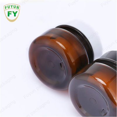 ขายส่งเครื่องสำอางบรรจุภัณฑ์อาหาร 30ml สีเหลืองอำพันสัตว์เลี้ยงสีดำขวดครีมเครื่องสำอางพลาสติกที่มีฝาปิดสีขาวสีดำ